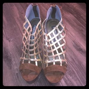 Women’s brown and gold booties